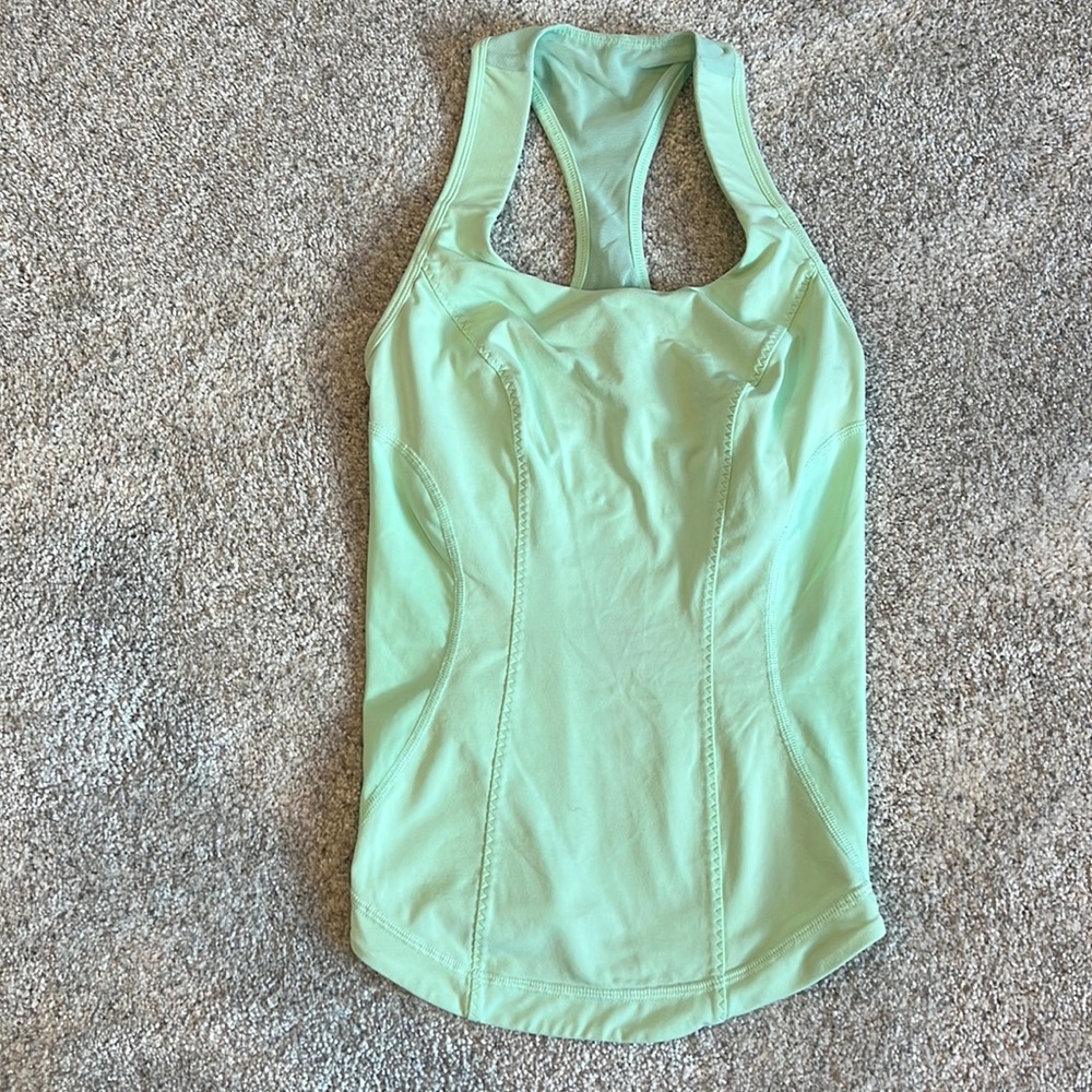 Lululemon mint tank top with built-in shelf bra and back phone pocket